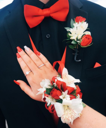 white corsage and boutonniere for prom