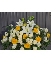 Bright Sunshine Casket Spray Funeral Flowers