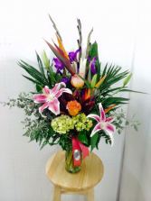 Brilliant Tropical and roses Vase arrangement