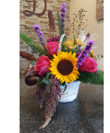 Bundle of sunshine Mix of colors in a basket in Louisville, OH | DOUGHERTY FLOWERS, INC.