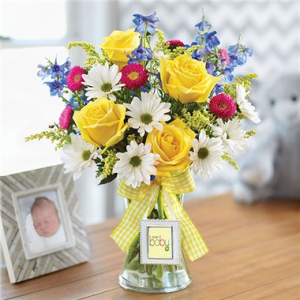 BUNDLES OF BLOOMS with sm. picture frame on vase 