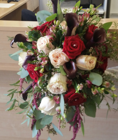 Burgandy, ivory and blush bouquet Calla lilys, roses and eucalyptus :