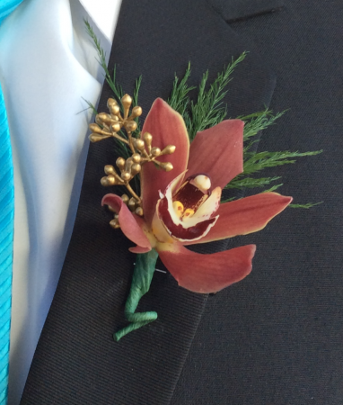Burgundy Orchid Boutonniere
