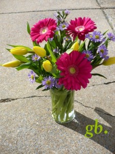 Bursting Spring Tulips Accented with Gerberas and Wild Daisies 11
