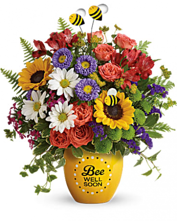 Buzzing Bee Well Pot of Flowers  in Dayton, OH | ED SMITH FLOWERS & GIFTS INC.