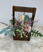 Candle on timer in wooden basket Permanent botanical