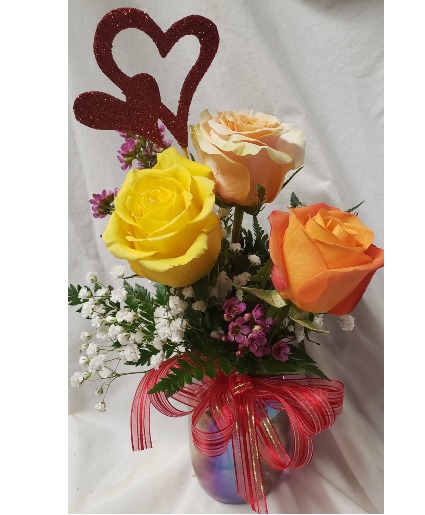 CANDY HEARTS... 3 mixed ROSES (colors will vary) In a pint iridescent mason jar with heart pic and seasonal filler and bow