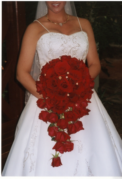 Brides teardrop in Bright Red roses 