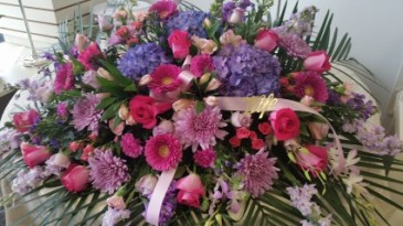 Casket cover Casket cover in rich tones of Pinks, Laverders, and Purples