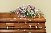 FOREVER IN OUR HEARTS Casket Spray