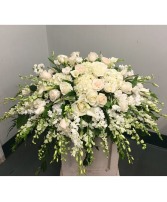 Casket Spray of white roses, orchids, etc. 