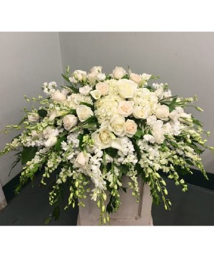 Casket Spray of white roses, orchids, etc. 