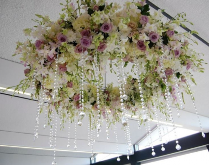 Ceiling light encircled by roses and crystals WEDDING