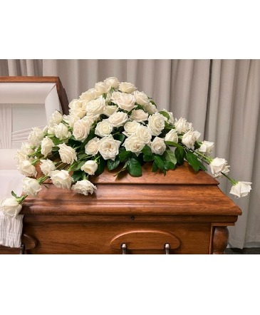 CELEBRATION OF LIFE CASKET SPRAY Funeral Flowers in Galveston, TX | MAINLAND FLORAL