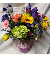 CERAMIC PITCHER WITH LACE DETAIL Arranged with bright seasonal flowers and included a Happy Mothers Day Pic!