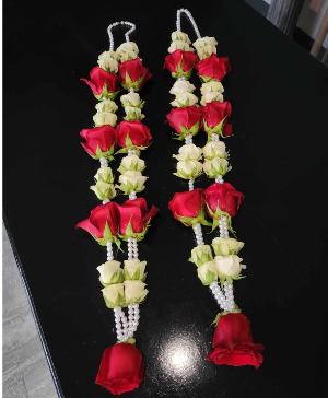 Ceremony floral garlands.  lei, mala, varamala  