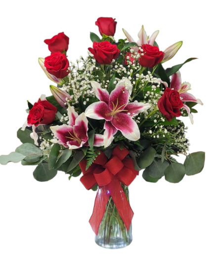 Charming Roses & Lily's 9 Red roses and 3 Oriental Lilys arranged