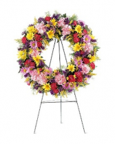 Cheerful mixed sympathy wreath Funeral tribute
