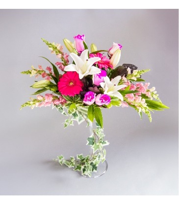 Cheers to us  Martini glass arrangement available Feb 10th in Bristol, CT | DONNA'S FLORIST & GIFTS