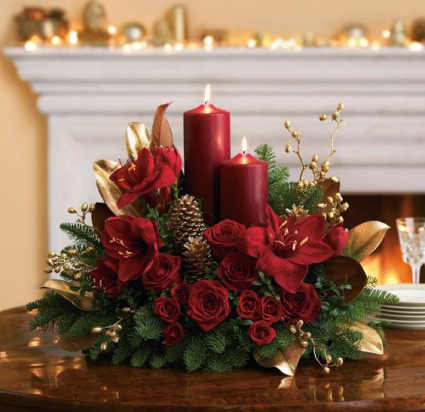 Christmas Centerpiece With Pillar Candles Golden Magnolia In Oakville On Ann S Flower Boutique Wedding Event Florist