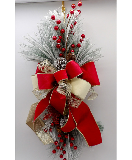 “Christmas Door Swag with Elegant Bow”