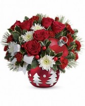 Christmas Joy of love in a red or silver planter  assorted fresh flowers
