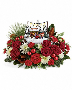 Christmas traditions centerpiece in Claremont, NH | FLORAL DESIGNS BY LINDA PERRON Christmas traditions centerpiece in Claremont, NH | FLORAL DESIGNS BY LINDA PERRON