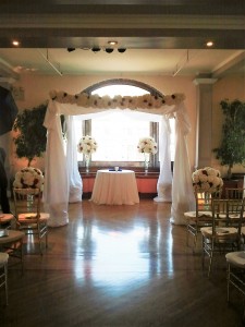 Chuppah with white and red flowers Ceremony  