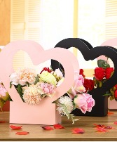 Ciao Bella  Assorted flowers in a heart shaped box