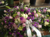 Classic casket spray of pinks, whites and lavender casket spray of pinks, whites, lavenders and purples