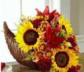 Classic Cornucopia For Thanksgiving  Basket with fall flowers 