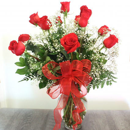 CLASSIC DOZEN LONG STEM ROSES IN A VASE