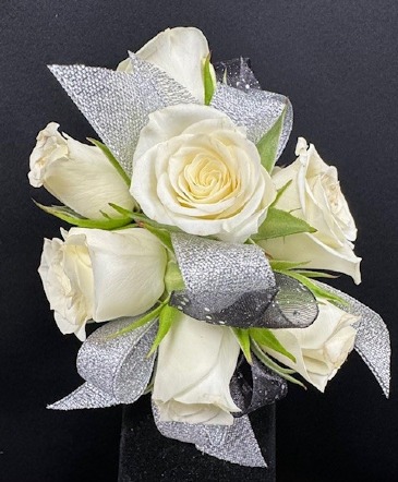 Classic White Wrist  Corsage in Denison, TX | JUDY'S FLOWER SHOPPE Classic White Wrist  Corsage in Denison, TX | JUDY'S FLOWER SHOPPE