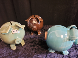 "Clay in Motion" pottery piggy bank 