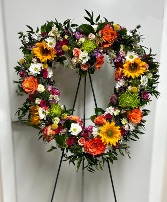 Colorful Embrace Funeral Spray