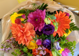 colorful loose wrapped bouquet 