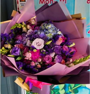 colorful mix wrapped bouquet MIX ARRANGEMENT