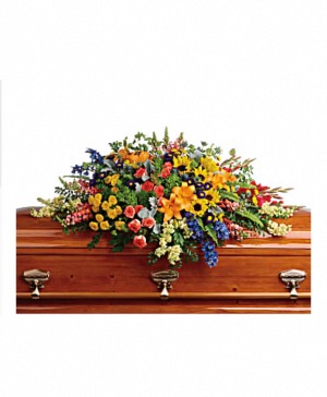 Colorful reflections casket spray 