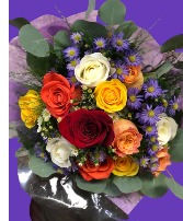 Colorful Dozen Wrap Roses Wrapped arrangement 