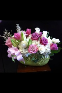 Compact rose, hydrangea, tulips and lily bouquet 
