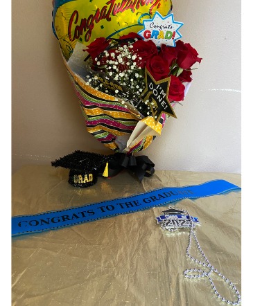 congrats to the grad hand wrapped with mylar dz roses red with congrats mylar in Renton, WA | Alicia's Wonderland II