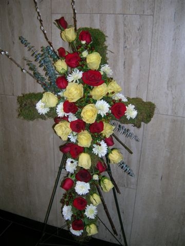 Contemporary Rose Cross Funeral arrangement