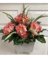 Coral hydrangeas and veronica in white tin Permanent botanical