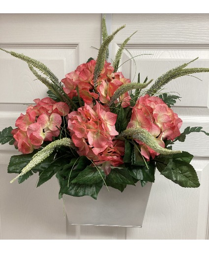 Coral hydrangeas and veronica in white tin Permanent botanical