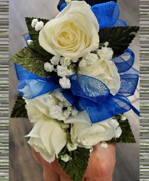 corsage with blue ribbon  