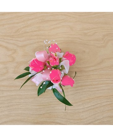 Corsage wristlet hot pink spray roses Corsage in Evanston, IL | West End Florist & Garden Center