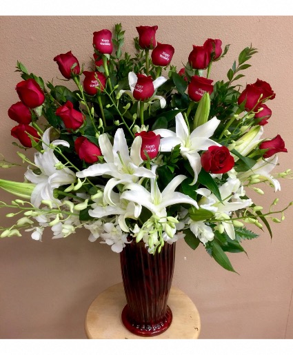 Crazy in love Roses Dendrobium and lilies 