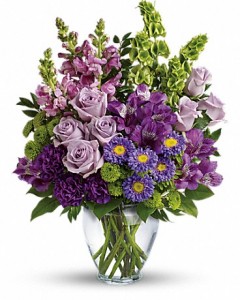 CRAZY IN LOVE DESIGNER CHOICE OF MEDIUM SIZED MIXED FLORAL ARRANGEMENT IN TALL VASE