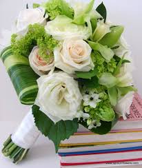 Cream and Green Flowers For both a Bride and can be made smaller for your girls..prices vary due to size.