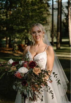 Cream & Crimson Bridal beauty, down to every petal